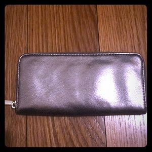 Gold metallic wallet style clutch